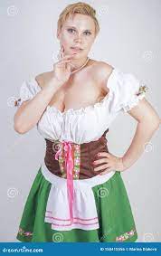 Cute Plus Size Girl with a Short Haircut and Big Breasts Dressed in a  National Bavarian Dress on a White Background in the Studio. Stock Photo -  Image of event, dirndl: 150415556