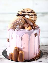 Who Would Think That Donuts Could Come Together To Make Such Appealing Cake Decorations Brilliant Chocolate Hazelnut Dri Drip Cakes No Bake Cake Yummy Cakes