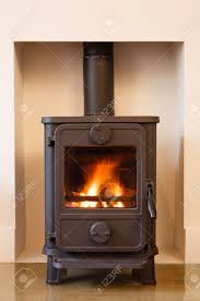 Wide range of gas and wood fireplaces and stoves. Cast Iron Wood Burning Stove In A Modern Contemporary Fireplace Stock Photo Picture And Royalty Free Image Image 14809592