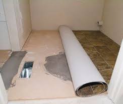 Roll Back Half Of The Vinyl Sheet Lay Down The First Half Of The Vinyl After Spreading G Vinyl Flooring Installation Vinyl Sheet Flooring Vinyl Flooring Rolls