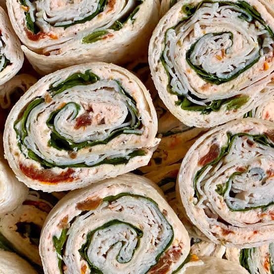Classic turkey pinwheels rolled tightly in flour tortillas., AI generated