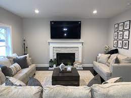 Farmhouse Family Room With Beige Black And White Touches Grey Family Rooms Brown Family Rooms Family Room