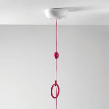 Porcelain light fixtures with a pull chain were about as cheap as you could get and it saved the hassle of you just ran the wiring in the loft and drilled through the ceiling. L973 Ceiling Pull Cord Sensorium