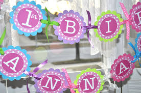 Pleased young woman in orange shirt looking at colorful balloons isolated on white. Cupcake Toppers 1st Birthday Girls Birthday Decorations Cupcake Picks Pink Lime Green Blue Purple And White Polkadots Set Of 12 So Sweet Party Shop