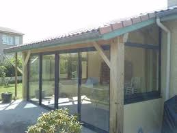 Elles sont à coupler avec des chaises de terrasse design. Fermeture D Une Terrasse Bois Avec Des Chassis Aluminium Terrasse Bois Terrasse Vitree Terrasse