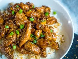Add 1 tbsp of sesame oil, 1/4 stock cube, 2 finely chopped garlic cloves, 1 tsp of chopped fresh ginger, 100ml rice wine vinegar, 150g honey and 4 tbsp dark brown sugar. Crispy Sesame Chicken With A Sticky Asian Sauce Recipe Cart