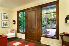 I use generic fiberglass exterior door units from a local supplier and they've performed just fine. Exterior Doors Tague Lumber