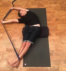 Bananasana Strap Offers Somethin To Pull And Bolster Increases The Angle Of Side Stretch Props To Vilmas Yin Yoga Poses Yoga Asanas Restorative Yoga Poses