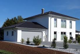 Eine Moderne Stadtvilla Perfekt Fur Kleine Grundstucke Fingerhuthaus Fertighaus Hausbau Neubau Haus Satteldach Modern Stadtvilla Fingerhut Haus Haus