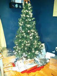 A Cat Proof Christmas Aluminum Foil Tree Skirt And Foil Wrapped Presents Cat Proofing Christmas Holidays Christmas