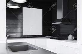 Choose from a range of finishes that will fit with any kitchen colour. Interior Of Modern Kitchen With Black Brick Walls White Countertops Stock Photo Picture And Royalty Free Image Image 115168872
