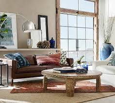 In addition to a lower price, the copycat version has great reviews and actually looks even better in purchasers' photos than in the stock photos on the website. Bullock Reclaimed Wagon Wheel Coffee Table Pottery Barn High End Furniture And Home Furnishings Equip Bid
