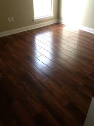 Pin By Acadian Flooring On Installation Gallery Ceramic Wood Tile Floor Wood Look Tile Ceramic Floor Tile