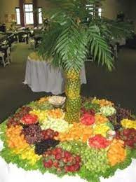 Resistant to storm winds, and offering great shade and cover, palm trees are reliably the seeds from the palm tree are used for food here in africa. Pineapple Palm Tree Centerpiece Fruit Display Wedding Fruit Party Fruit Display