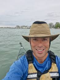 Ok, who's paddling at Belle Isle? Awesome! (Paddler is dead center of pic.) 