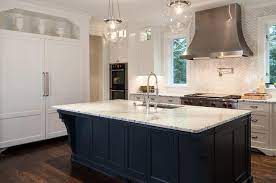 Maybe you would like to learn more about one of these? White Kitchen With Dark Blue Island Transitional Kitchen