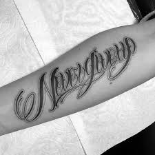 The reason for it is quite simple: 60 Never Give Up Tattoos For Men Phrase Design Ideas