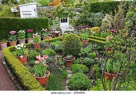 Potager Garden With Herbs And Tulips In Containers Roscullen Edinburgh Scotland Stock Image Potager Garden Garden Design Plans Veggie Garden