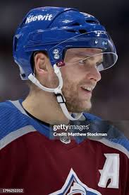 Samuel Girard of the Colorado Avalanche advances the puck against... News  Photo