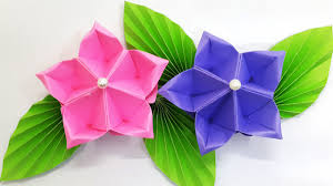 Here's an easy paper craft to make with the kids. Colors Paper Paper Flower Tutorial Origami Flower Amazing And Easy Diy Flowers