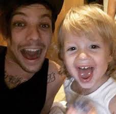 louis tomlinson with his little siblings doris and ernest; a thread