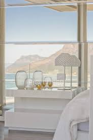 Your bedroom was probably the first room you ever helped to decorate. Modern Luxury Bedside Table And Decor In Home Showcase Bedroom With Ocean And Mountain View Travel Scenic View Stock Photo 199356388