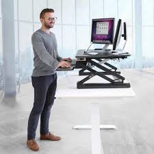 Desk riser blocks are simple blocks that help lift your desk up. Seville Classics Airlift Pro 35 4 Electric Sit Stand Desk Riser With Usb Charging Port Tablet Slot Costco