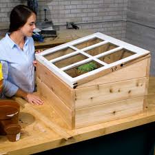 Laying out the windows to see how they would look before building was very important. Build A Mini Greenhouse With An Old Window Diy Family Handyman