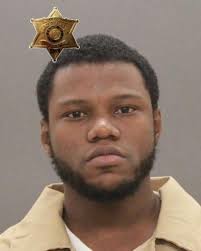 Inmate catches felony for damaging cell door