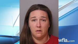 Polk County high school softball coach charged with stealing money given to  team