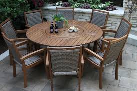 Add this table to your patio, deck, or poolside entertaining area. Large Round Eucalyptus Wood 63 Lazy Susan Dining Table