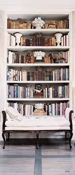 French Colonial Traditional Vintage Bookshelf I Like The Bookshelf With The Accessories But The Sofa Is Not My Style Home Home Decor Vintage Bookshelf