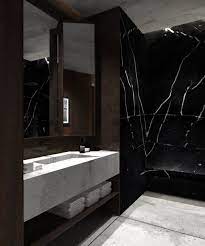 If you're on the lookout for small bathroom flooring ideas, consider unique materials like concrete or playful tile patterns that will anchor the room. Black Marble Bathroom Design Trendecors