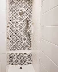 We Love This Shower Tile Used For An Accent Wall With Penny Rounds On The Floor Featured Art Sysley Large Shower Tile Shower Tile Patterns Shower Accent Wall