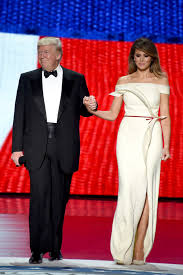 Ever the style maven, melania paired the checkered wool coat, which hit right at the knee, with black point christian louboutin heels. Melania Trump S Inauguration Dress Designer Thrust Into The Spotlight Monticello News