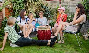 Check spelling or type a new query. A Group Of Friends Sitting Together In A Garden In Summer By Kkgas
