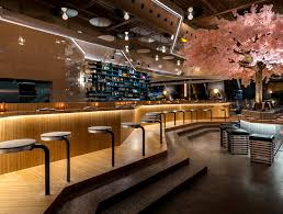 A Japanese Restaurant In Montreal With A Blossom Tree Stole Our Hearts Japanese Restaurant Design Japanese Bar Architecture Design