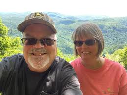 What do the symbols > and X mean in drumming?