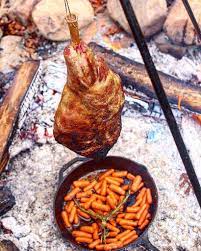 Hanging Lamb Leg Over The Fire Cooking Recipe Fire Cooking Cooking Fire Food
