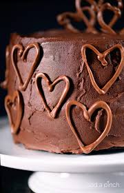 Follow with a ring of white buttercream, then red. Celebration Chocolate Cake Recipe And Some News Add A Pinch