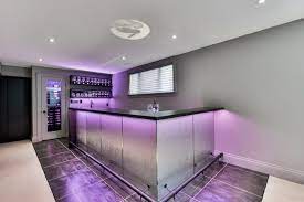 In order to modernize your home bar consider having a curved bar table instead. Montgomery Modern Bar Walk In Wine Cellar Modern Home Bar Toronto By Wilde North Houzz Uk