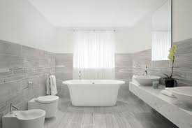 Bathroom wall tiles are one of the best ways to transform your bathroom into a beautifully stylish look and a relaxing spa retreat. Porcelain Tile With Mixed Look Of Wood Stone And Concrete From Marmomix Wood Tile Bathroom Luxury Bathroom Grey Bathrooms