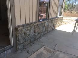 Veneer them in handsome stone to turn your embarrassing entry into a welcoming focal point. Stone Veneer And Fireplace Surround Dan Dewolf Masonry And Contracting