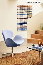 the swan chair by arne jacobsen in 2020 luxury furniture brands contemporary furniture design eames lounge chair