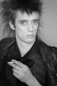 I met a man in a bar Folk music is his bend We sat and talked awhile I felt  like I was his friend It was along the mercy river He talked