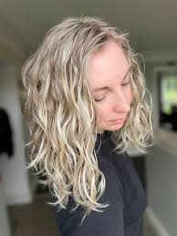 Thought I would share a few of my curly/wavy girls from yesterday!! The  blonde angled bob came in with almost straight, very very thick hair. She  had just chopped over 2ft of