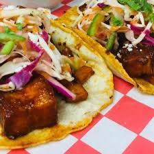 Roasted chicken, barbeque sauce, red onion, jack and cheddar cheese, drizzled with sour cream and cilantro. Taco Tuesday Taco Mama S Food Will Knock You Out Ay Magazine