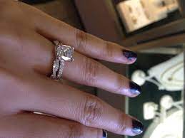 Twisted Wedding Band Paired With A Traditional Channel Set Engagement Ring Twist Wedding Band Pave Wedding Rings Diamond Wedding Bands