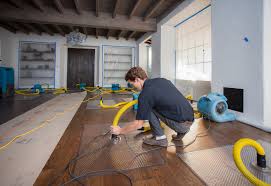 Prime Restore Services technician working on damage site