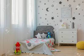 Therefore, only single bed decor that meet set guidelines are available. Light Child Bedroom With Single Bed And Star Wall Decor Stock Photo Picture And Royalty Free Image Image 63723053
